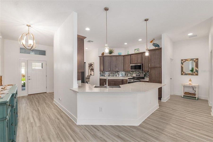 Furnished interior view inside a new home in , The Villages (Image 15).