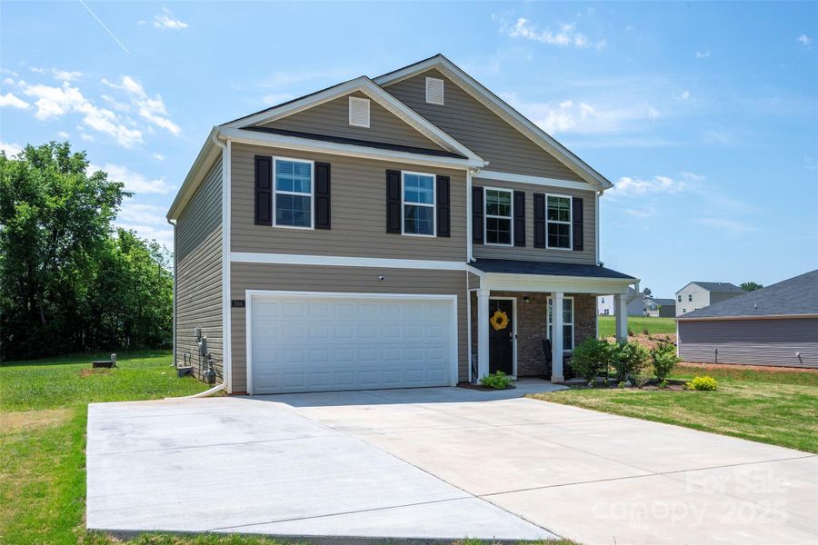 Front exterior of a new home in , Lexington, NC, highlighting curb appeal (Image 2).