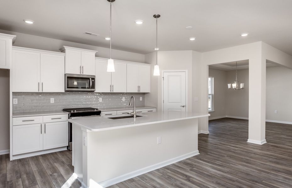 Representative furnished interior of a home built from the Richton by Pulte Homes in Riverlights, Wilmington (Image 6).
