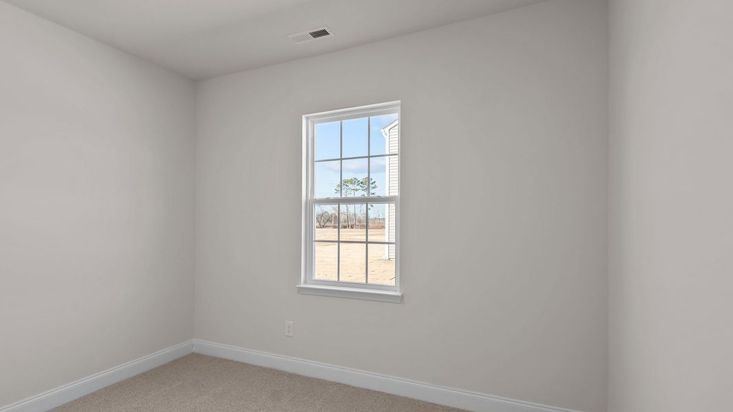 Spacious, unfurnished interior of a new home in Bedford Place, Wilson (Image 16). Spacious, unfurnished interior of a new home in Bedford Place, Wilson (Image 16).