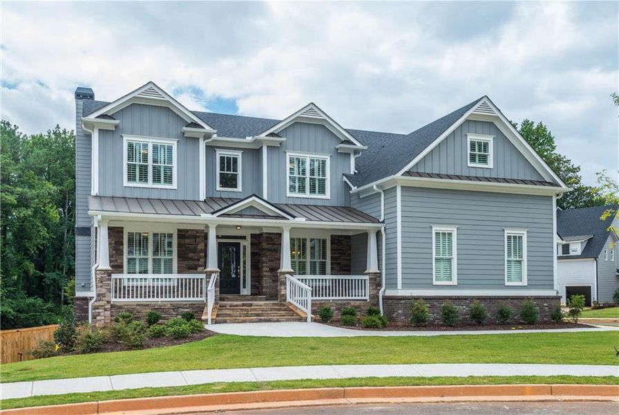 Front exterior of a new home in , Woodstock, GA, highlighting curb appeal (Image 2). Front exterior of a new home in , Woodstock, GA, highlighting curb appeal (Image 2).