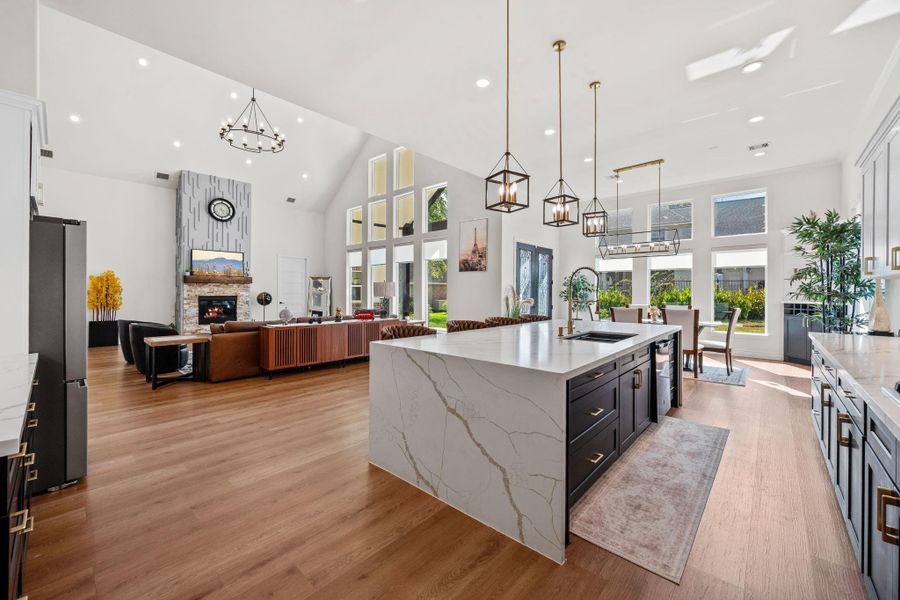 The waterfall countertop brings a beautiful touch to the kitchen