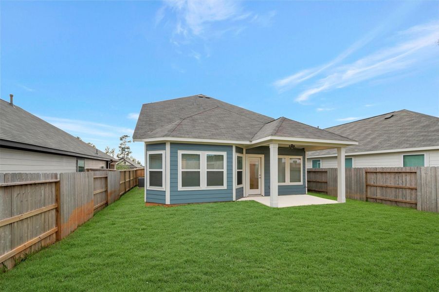 Exterior details and patio area of a home in Lone Star Landing, Montgomery (Image 26).