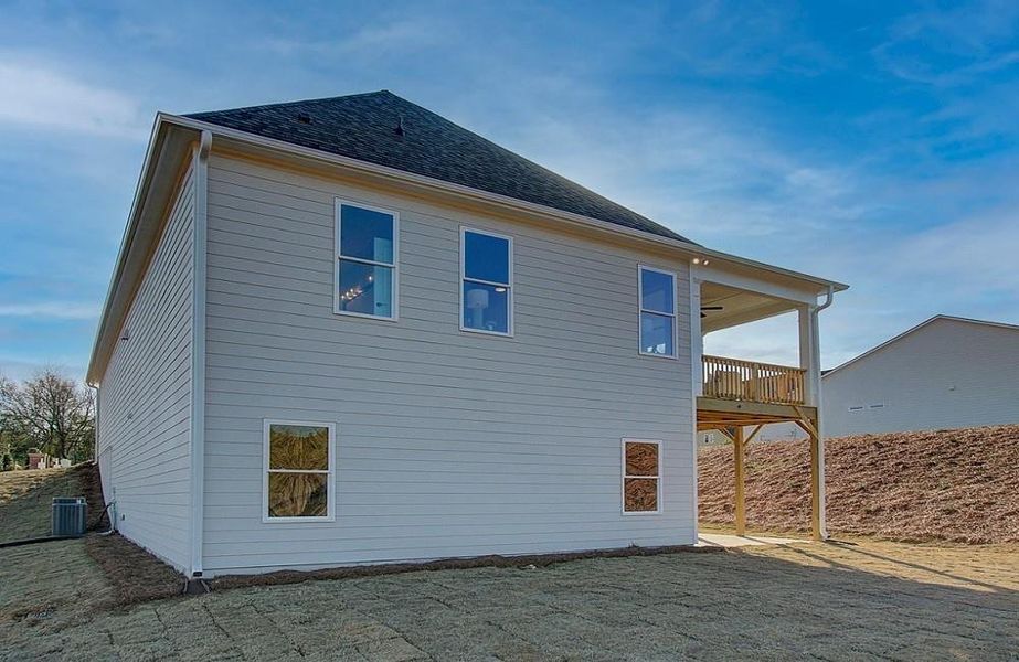 Front exterior of a new home in Courtyards at Traditions, Cumming, GA, highlighting curb appeal (Image 24).