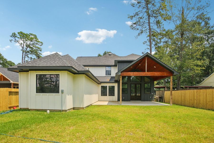 Front exterior of a new home in , Willis, TX, highlighting curb appeal (Image 21).