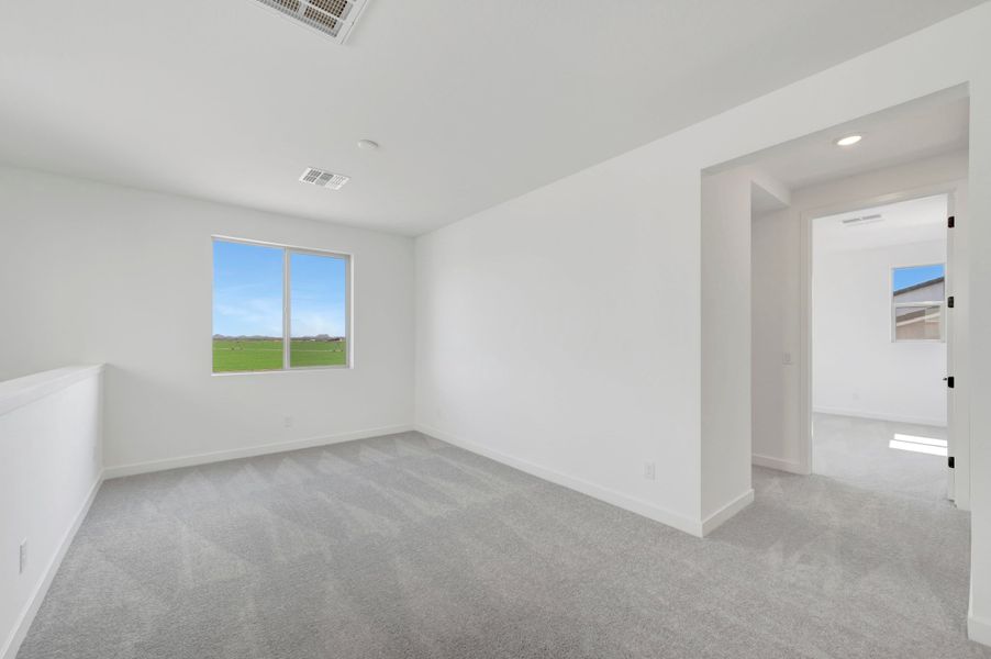 Spacious, unfurnished interior of a new home in Soleo, San Tan Valley (Image 35).