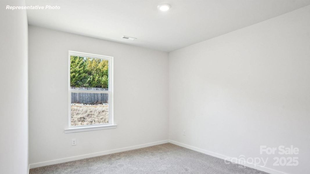 Spacious, unfurnished interior of a new home in Reedy Creek Preserve, Charlotte (Image 12).