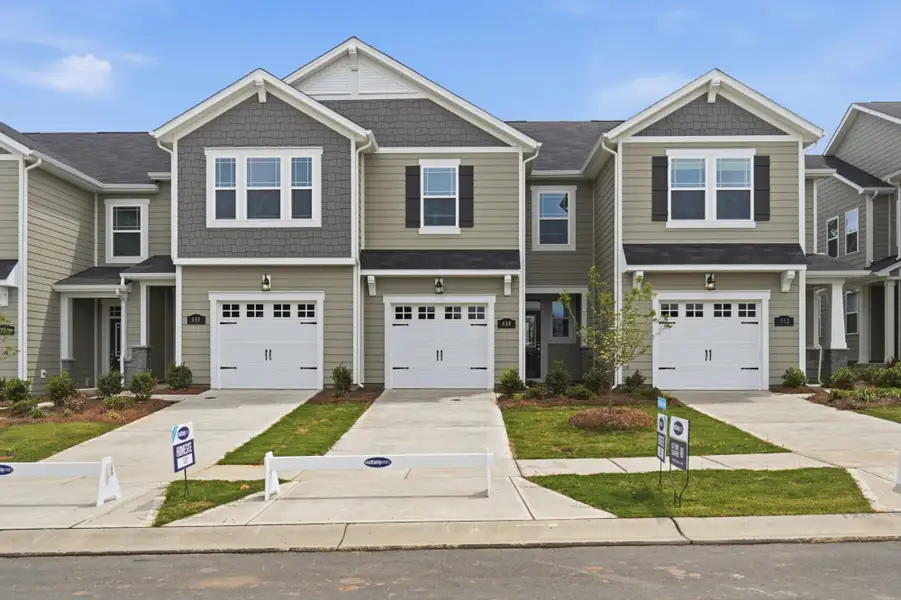 Front exterior of a new home in Arbor Chase, Clover, SC, highlighting curb appeal (Image 1). Front exterior of a new home in Arbor Chase, Clover, SC, highlighting curb appeal (Image 1).