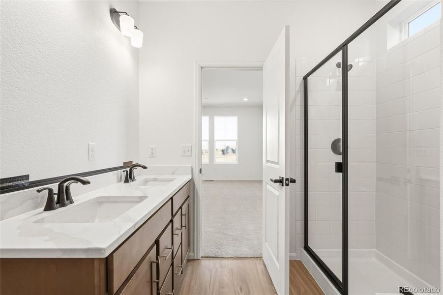 Furnished interior view inside a new home in The Nest Classic at Canyon Creek, Erie (Image 13).