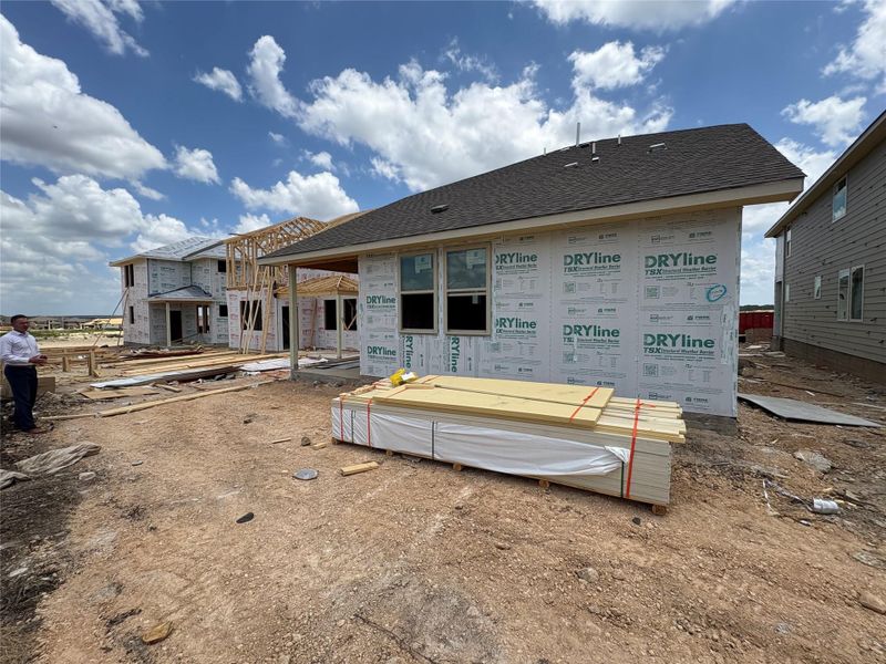 Front exterior of a new home in The Homestead at Lariat, Liberty Hill, TX, highlighting curb appeal (Image 10). Front exterior of a new home in The Homestead at Lariat, Liberty Hill, TX, highlighting curb appeal (Image 10).