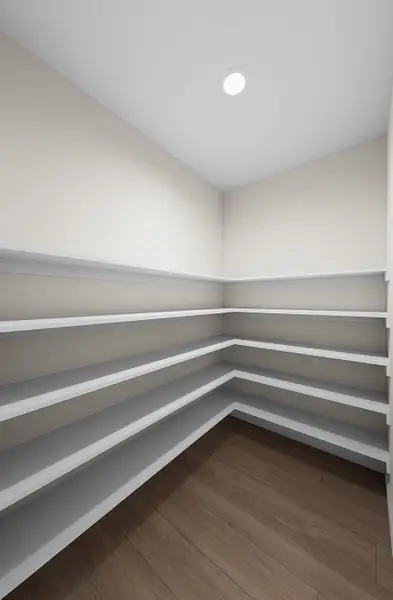 Representative unfurnished interior of a home built from the Mercel by Grenadier Homes in The Garden Homes at Swan Lake Estates, Dallas (Image 19).