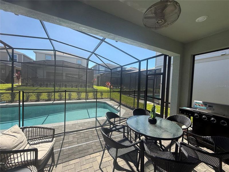 Exterior details and patio area of a home in Windsor Cay Resort, Clermont (Image 1).