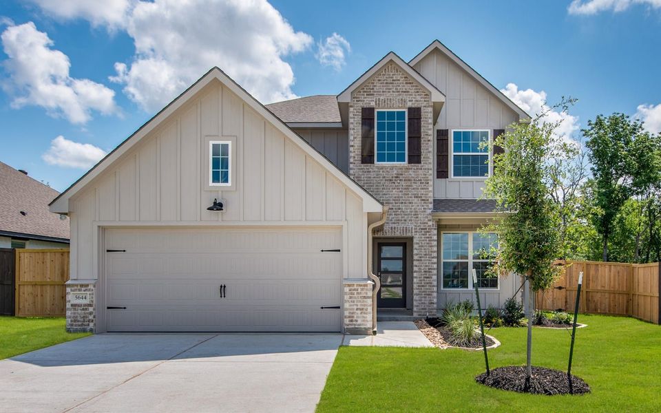 Front exterior of a new home in The Reserve at Turnbo Ranch, Killeen, TX, highlighting curb appeal (Image 1). Front exterior of a new home in The Reserve at Turnbo Ranch, Killeen, TX, highlighting curb appeal (Image 1).