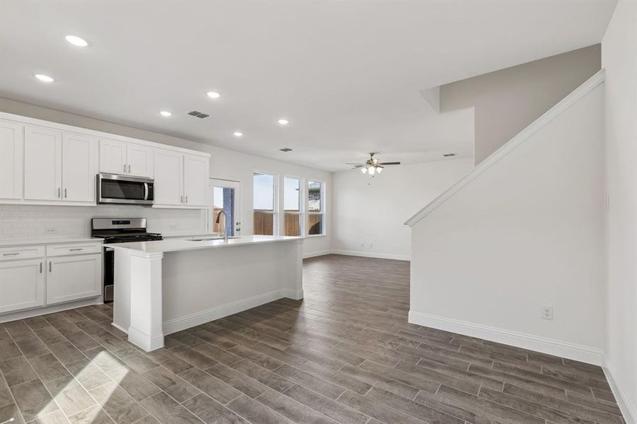 Furnished interior view inside a new home in AnaCapri, Anna (Image 6).
