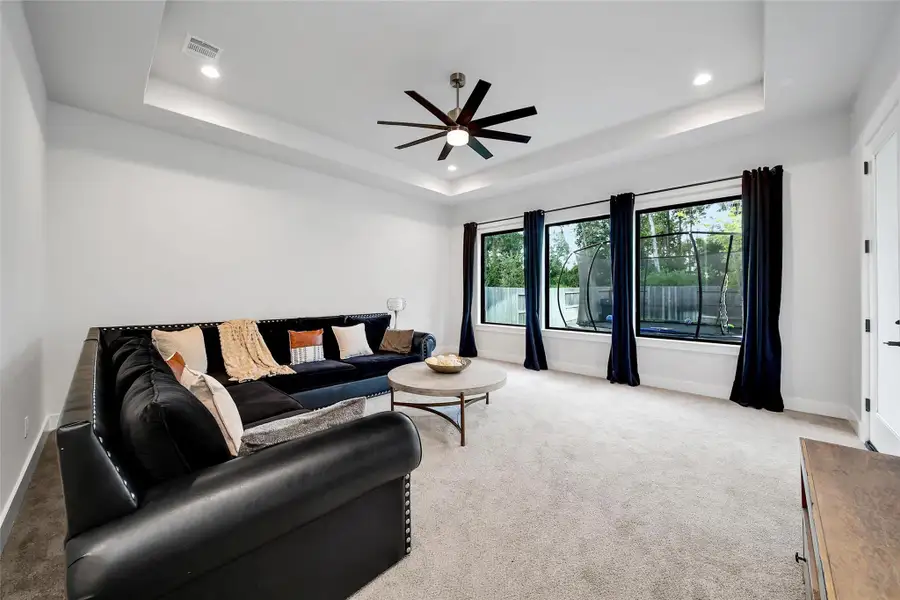 Furnished interior view inside a new home in ARTAVIA, Conroe (Image 19).