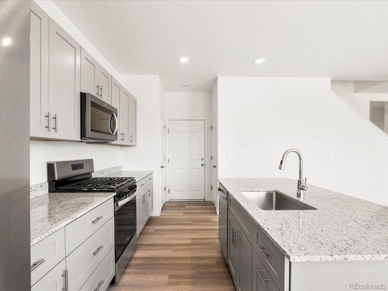 Furnished interior view inside a new home in Ridgeline Vista: The Flora Collection, Brighton (Image 13).