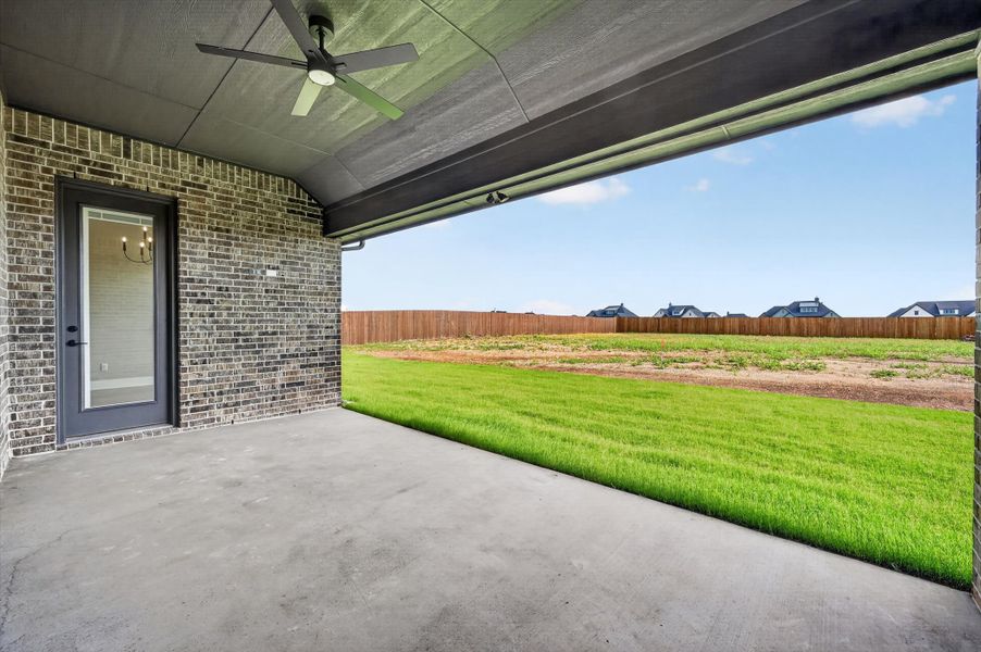 Front exterior of a new home in Coyote Crossing, Godley, TX, highlighting curb appeal (Image 21). Front exterior of a new home in Coyote Crossing, Godley, TX, highlighting curb appeal (Image 21).