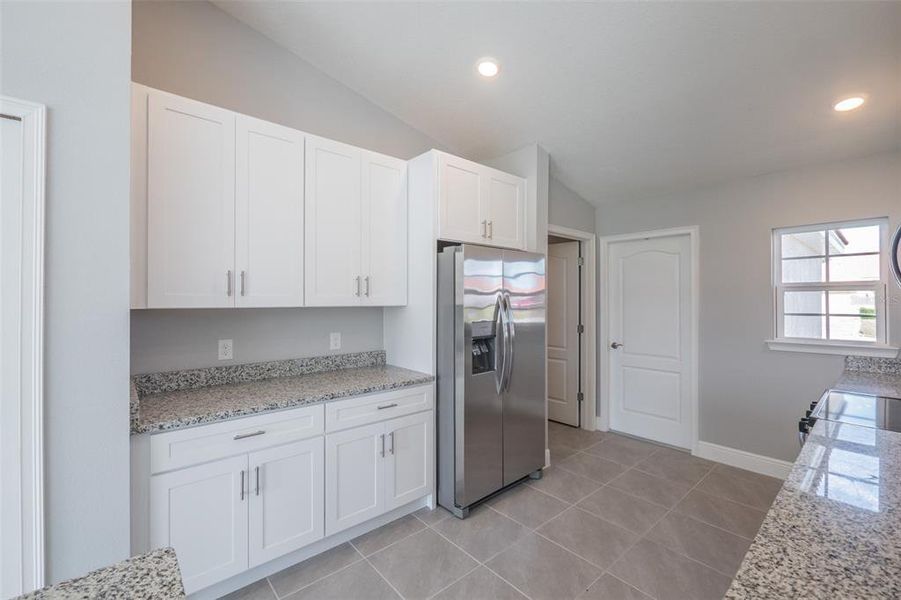 Furnished interior view inside a new home in , Kissimmee (Image 6).