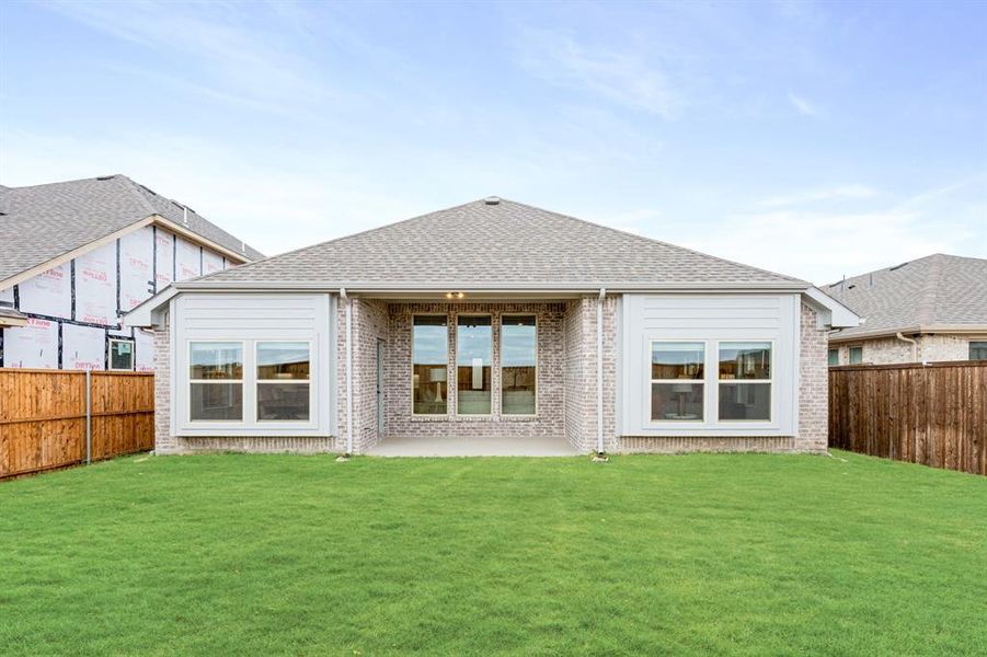 Exterior details and patio area of a home in ArrowBrooke, Aubrey (Image 4).