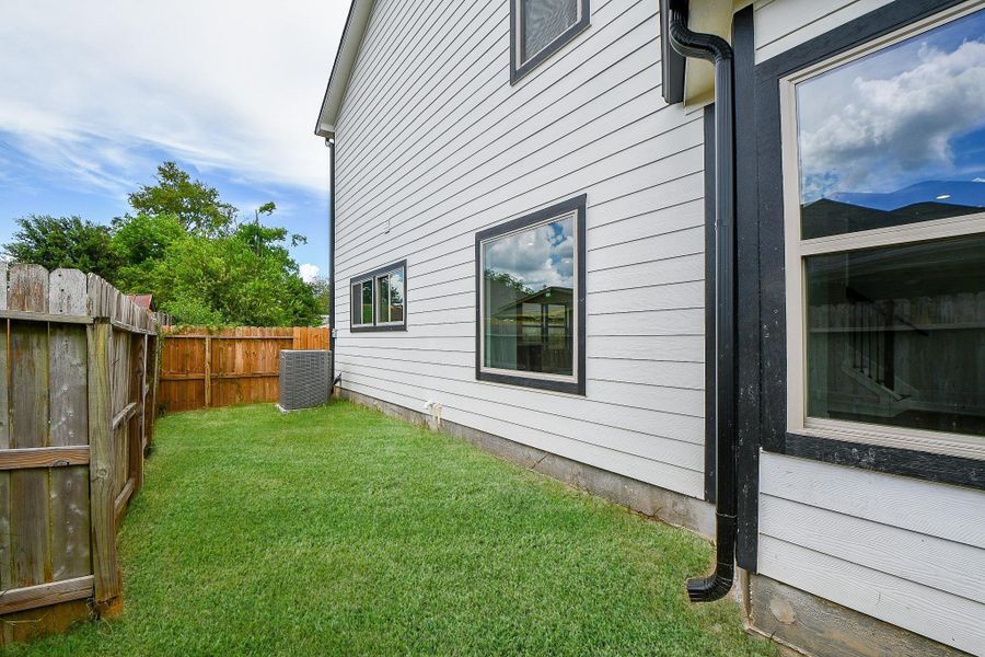 Exterior details and patio area of a home in , Houston (Image 3).