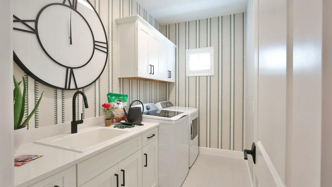 Furnished interior view inside a new home in Boca Royale Golf & Country Club Real Estate and Homes for Sale in Englewood, FL - Neal Communities, Englewood (Image 7). Furnished interior view inside a new home in Boca Royale Golf & Country Club Real Estate and Homes for Sale in Englewood, FL - Neal Communities, Englewood (Image 7).