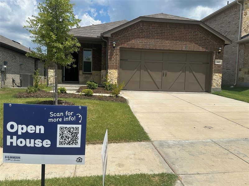 Front exterior of a new home in Cartwright Ranch, Crandall, TX, highlighting curb appeal (Image 13). Front exterior of a new home in Cartwright Ranch, Crandall, TX, highlighting curb appeal (Image 13).
