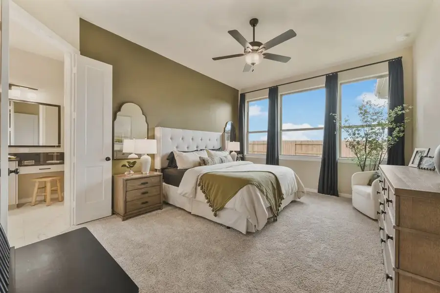 Representative furnished interior of a home built from the Lynnbrook by Chesmar Homes in The Trails, New Caney (Image 9).