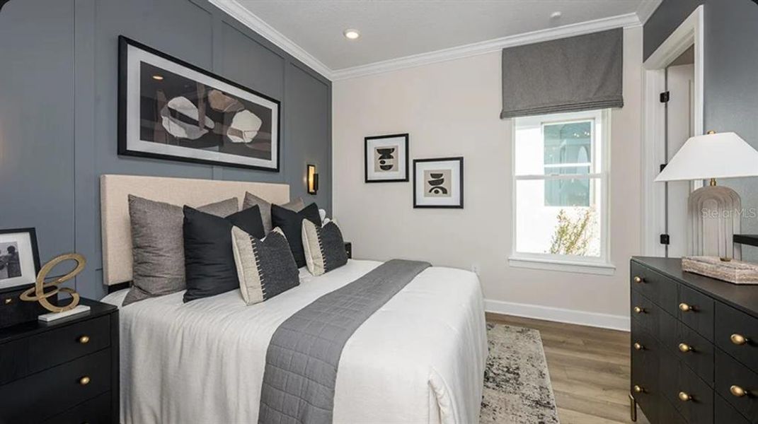 Furnished interior view inside a new home in Esplanade at McKinnon Groves, Winter Garden (Image 9).
