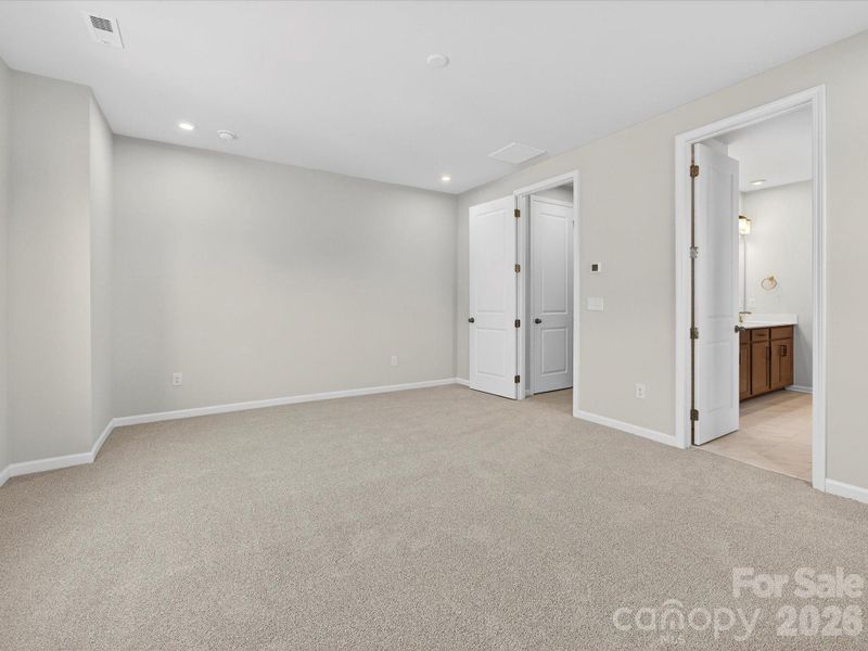 9' Ceilings and 8' Doorways at Primary Suite.