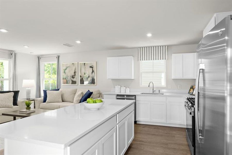 Representative furnished interior of a home built from the Ellis by Ryan Homes in Middle Creek Village Coastal Cottages & Villas, Bolivia (Image 8).