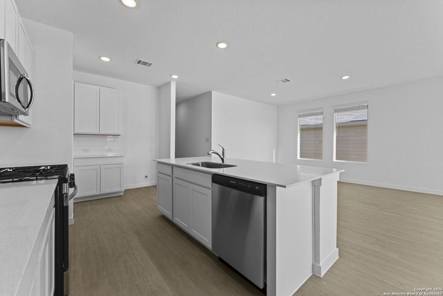 Furnished interior view inside a new home in , New Braunfels (Image 6).
