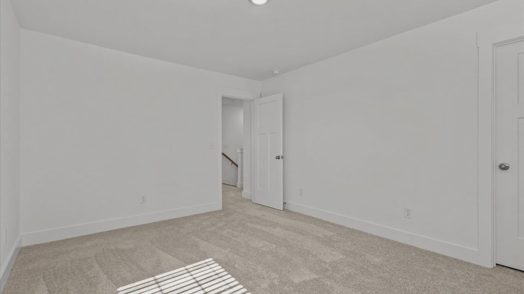 Representative unfurnished interior of a home built from the Freesia by DRB Homes in Pleasant Falls, Moore (Image 30).