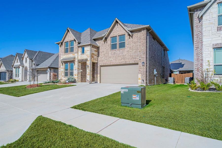 Front exterior of a new home in Eagle Glen 50, Alvarado, TX, highlighting curb appeal (Image 20).