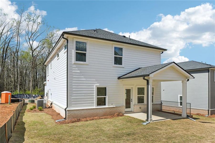 Exterior details and patio area of a home in Hemingway - Reserve Series, Cumming (Image 31).