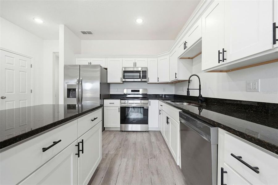 Furnished interior view inside a new home in , Haines City (Image 6).