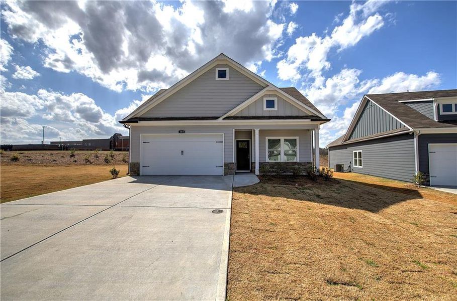Front exterior of a new home in , Cartersville, GA, highlighting curb appeal (Image 31).