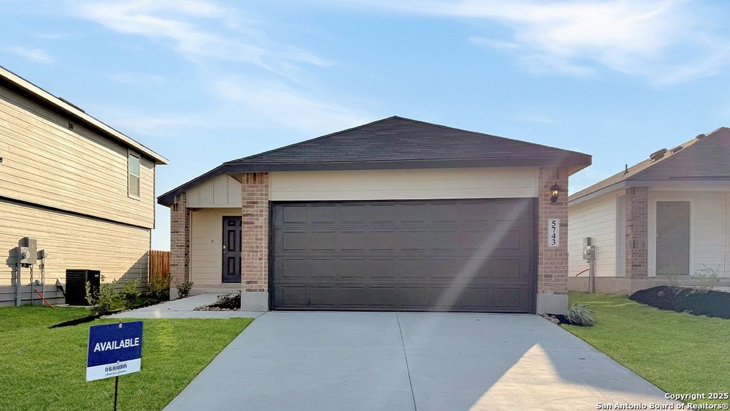 Front exterior of a new home in Stonehill, San Antonio, TX, highlighting curb appeal (Image 2). Front exterior of a new home in Stonehill, San Antonio, TX, highlighting curb appeal (Image 2).