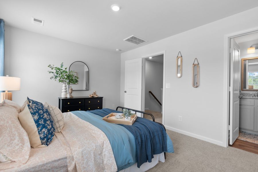 Representative furnished interior of a home built from the Palmetto II by McGuinn Homes in Clarke Townes, Anderson (Image 40).