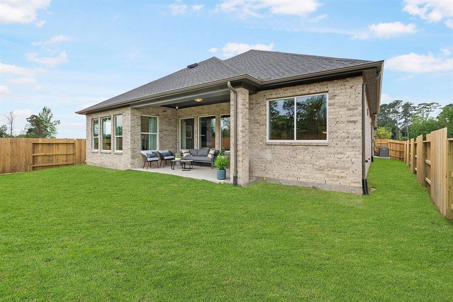 EXAMPLE PHOTO: All brick exterior with fully sodded lawn with sprinklers & full gutters.