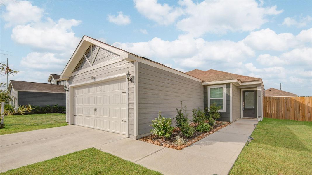 Front exterior of a new home in Wayside Village, Houston, TX, highlighting curb appeal (Image 2).