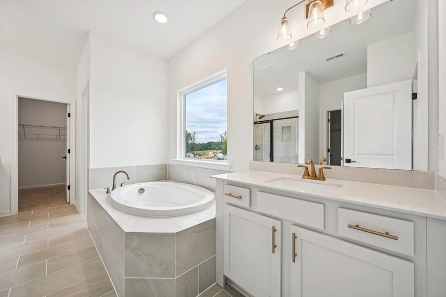 Primary Bath featuring the AW Collection® Serene - Clean forms offer quiet luxury.