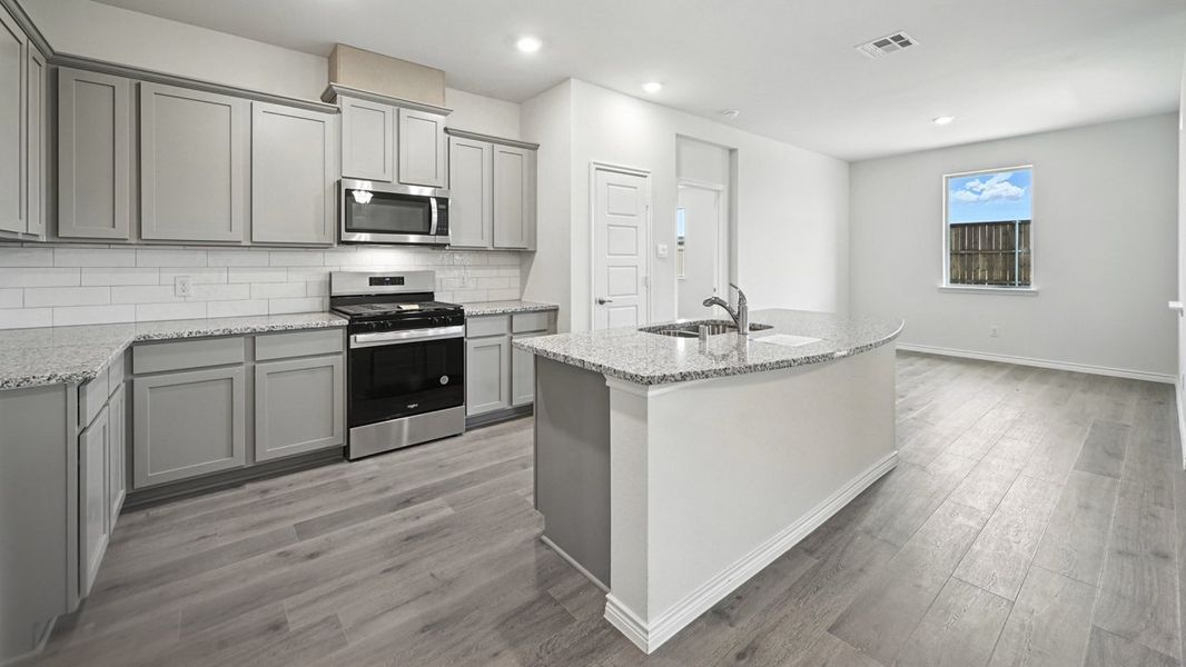 Representative furnished interior of a home built from the Rivington by D.R. Horton in Bel Air Village, Sherman (Image 4).