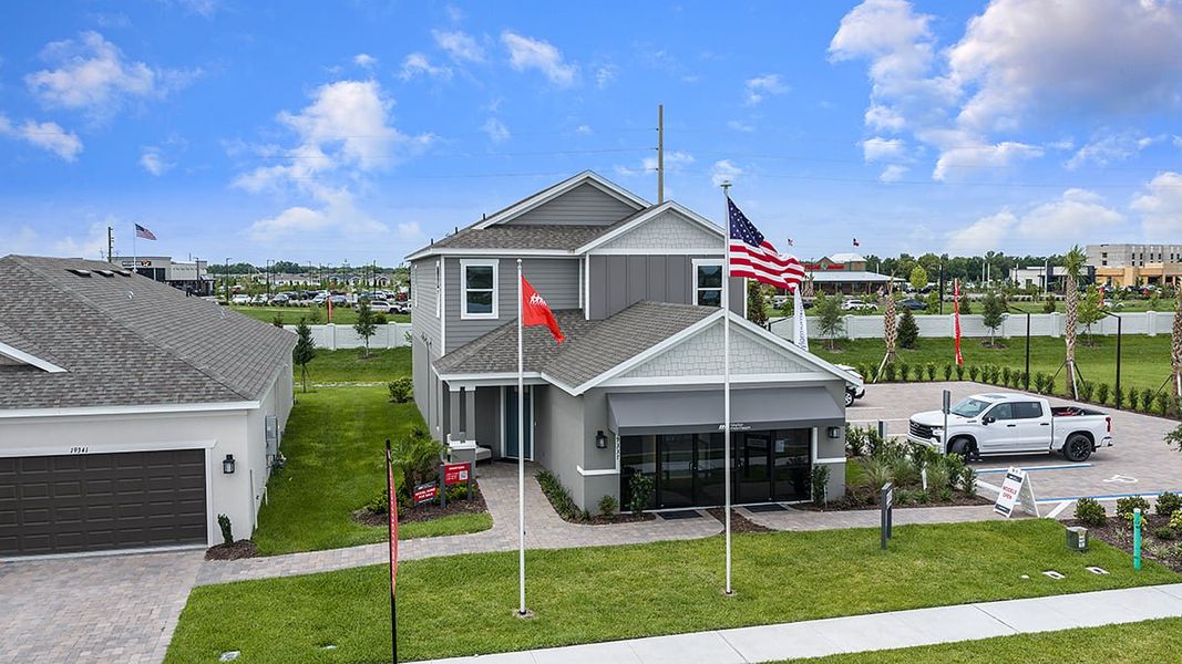 Front exterior of a new home in Lochside, Mount Dora, FL, highlighting curb appeal (Image 22).
