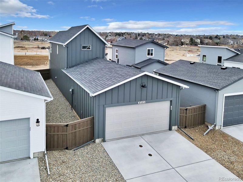 Front exterior of a new home in , Colorado Springs, CO, highlighting curb appeal (Image 17). Front exterior of a new home in , Colorado Springs, CO, highlighting curb appeal (Image 17).