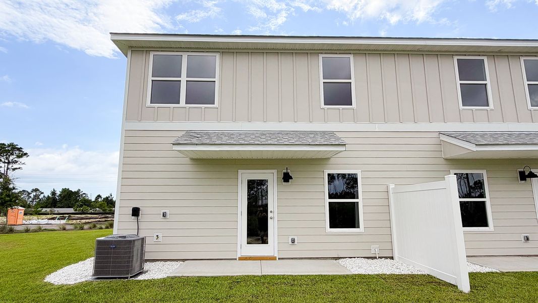 Exterior details and patio area of a home in WindMark Beach, Port Saint Joe (Image 26).