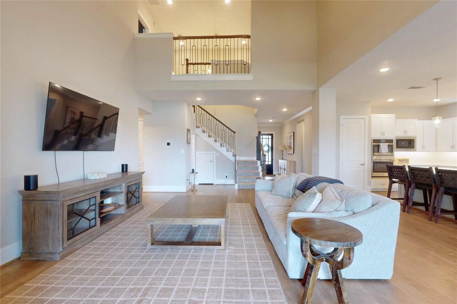 Vaulted ceiling in family  room open to 2nd floor walkway.