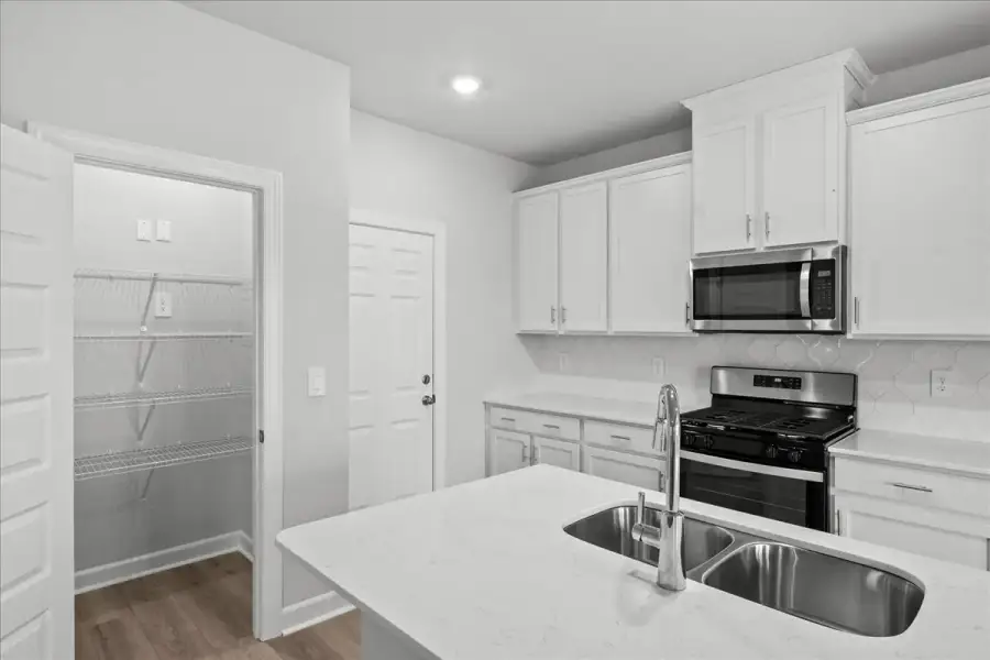 Furnished interior view inside a new home in The Farm at Wells Creek - Heritage Collection, Gray Court (Image 4).