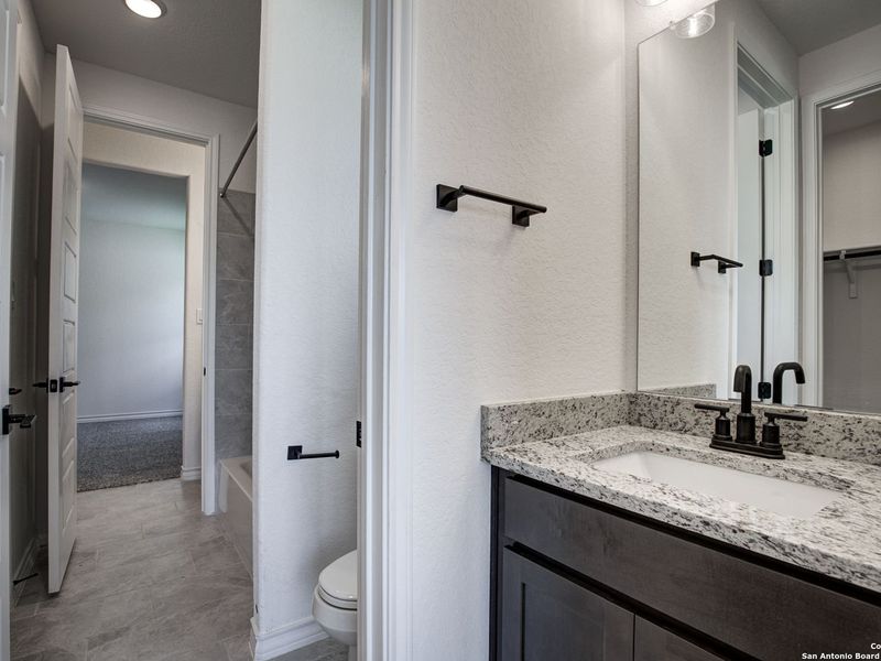 Furnished interior view inside a new home in The Reserve at Potranco Oaks, Castroville (Image 17).