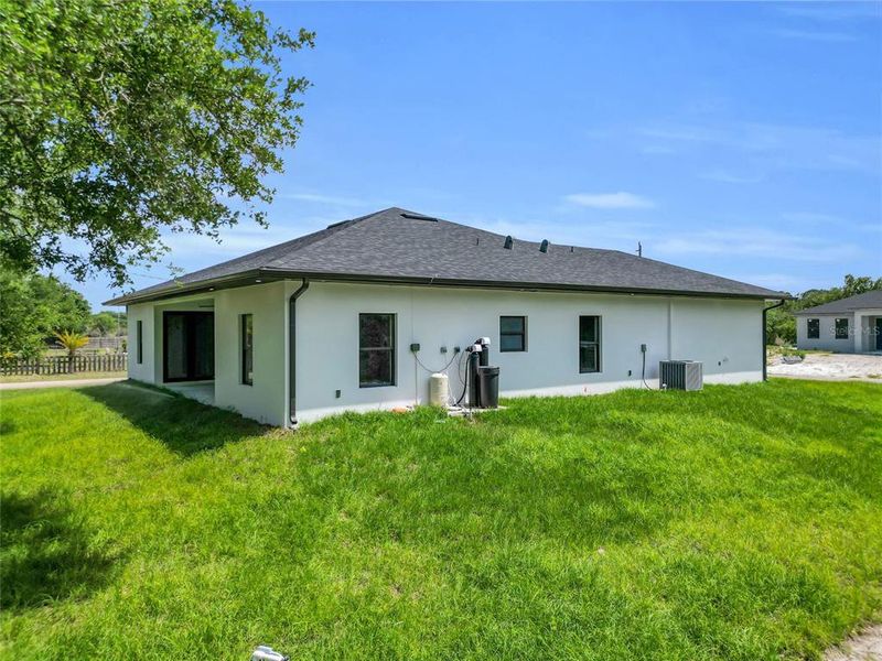 Exterior details and patio area of a home in , Lehigh Acres (Image 3).