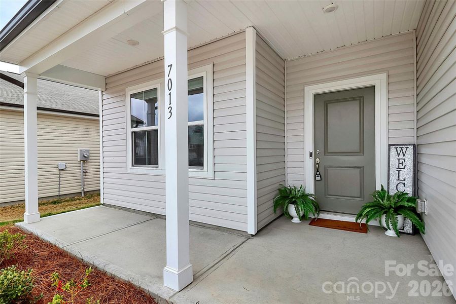 Exterior details and patio area of a home in Sunbriar, Charlotte (Image 4).